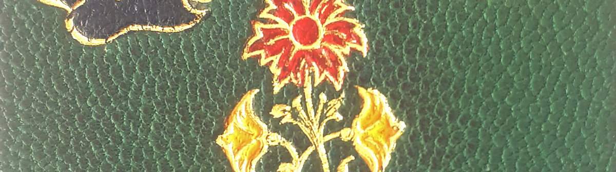 plaquette de cuir avec fleurs en mosaïque de cuir décor de livre en couleur dorure